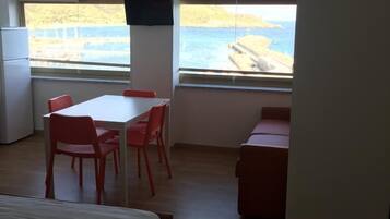 Family Studio, Sea View | Desk, iron/ironing board, free WiFi, bed sheets