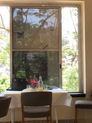 Breakfast, lunch, dinner served; local and international cuisine