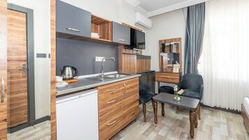 Standard Studio | Egyptian cotton sheets, premium bedding, down comforters, in-room safe