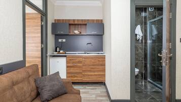 Family Suite, 1 Bedroom | Egyptian cotton sheets, premium bedding, down comforters, in-room safe