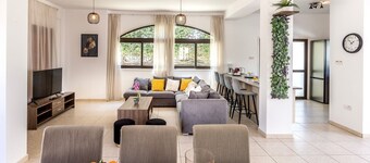 Welcome to our beautiful 5-bedroom villa, situated near the stunning Konnos beach