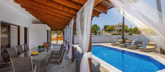 Welcome to our beautiful 5-bedroom villa, situated near the stunning Konnos beach