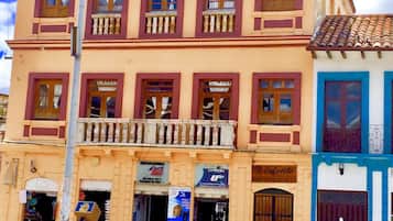 Stunning building with balconies and large windows, offering a glimpse into the local culture.