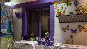 Double or Twin Room | Living area | Flat-screen TV