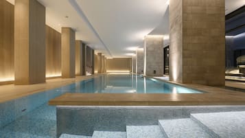 Indoor pool, open 6:00 AM to 9:00 PM, pool loungers