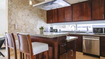 Luxury Condo, 2 Bedrooms, Pool View, Courtyard Area | Private kitchen | Fridge, dishwasher, cookware/dishes/utensils