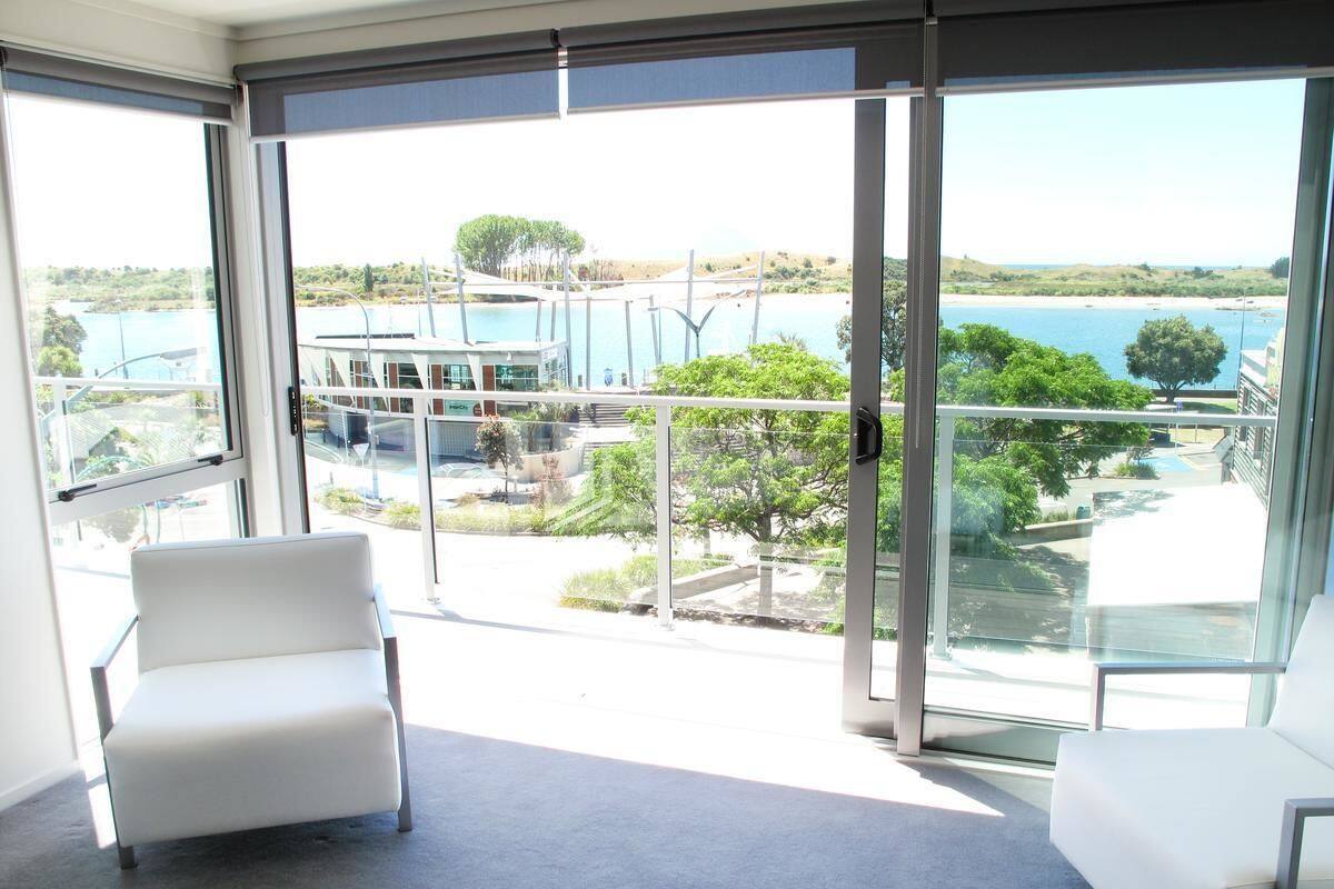 Executive Apartment, Harbor View | Soundproofing, iron/ironing board, WiFi (free), individually decorated