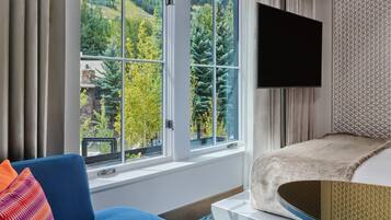 Premium bedding, down comforters, pillowtop beds, minibar