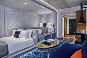 Premium bedding, down comforters, pillowtop beds, minibar