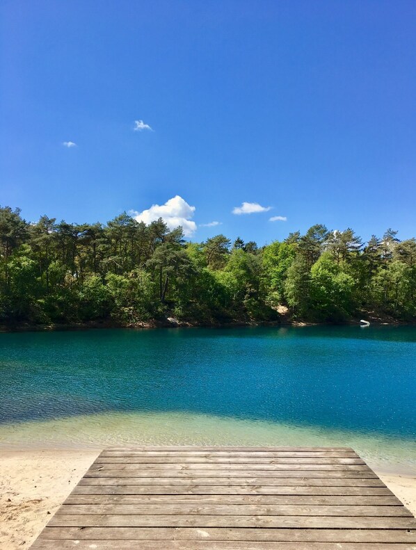 On the beach, sun-loungers