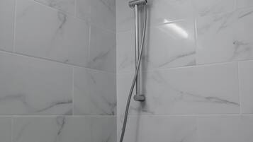 Hair dryer, towels, soap, shampoo