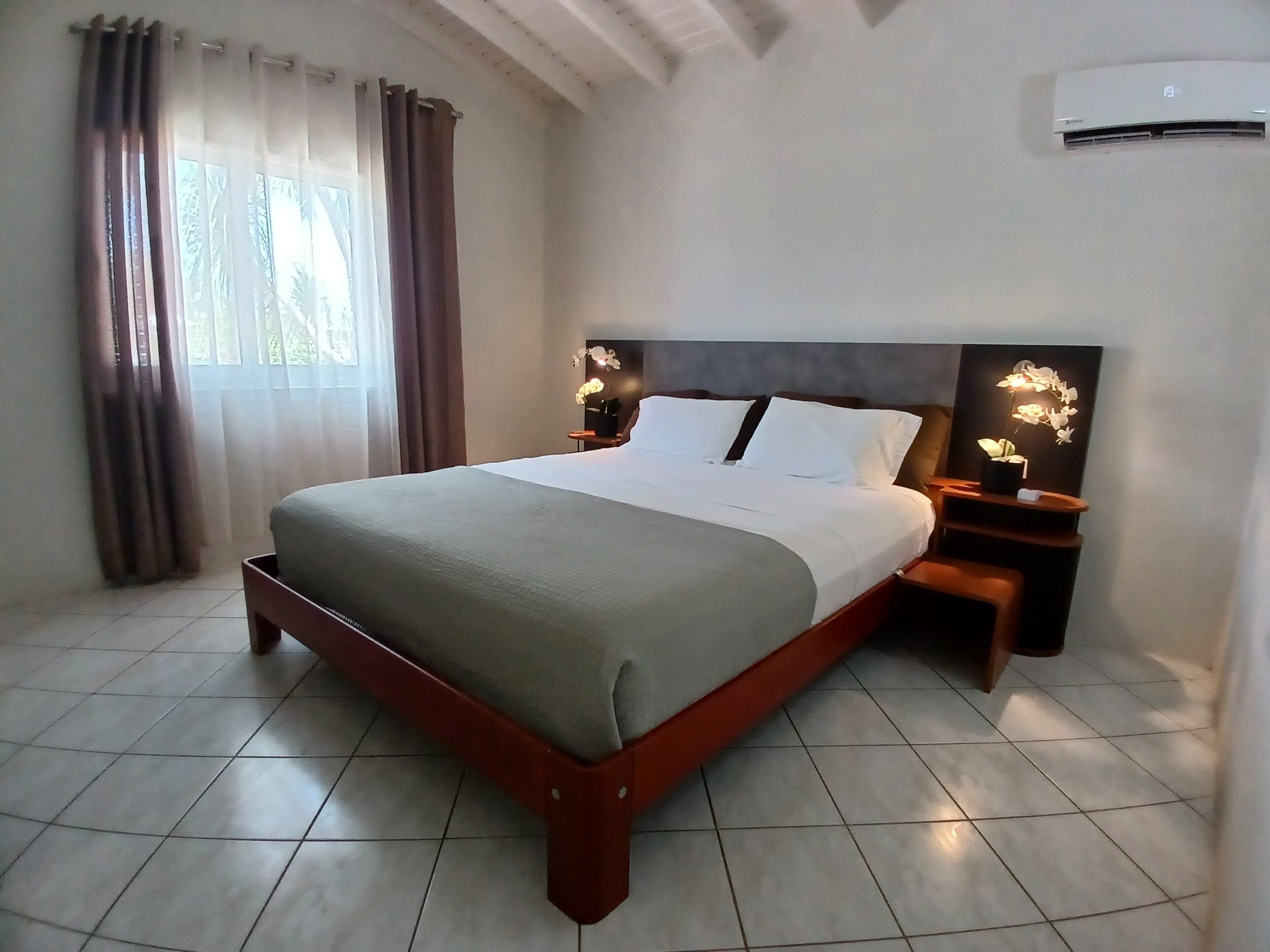 Exclusive House | Hypo-allergenic bedding, down comforters, in-room safe