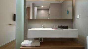 Shower, free toiletries, hair dryer, slippers