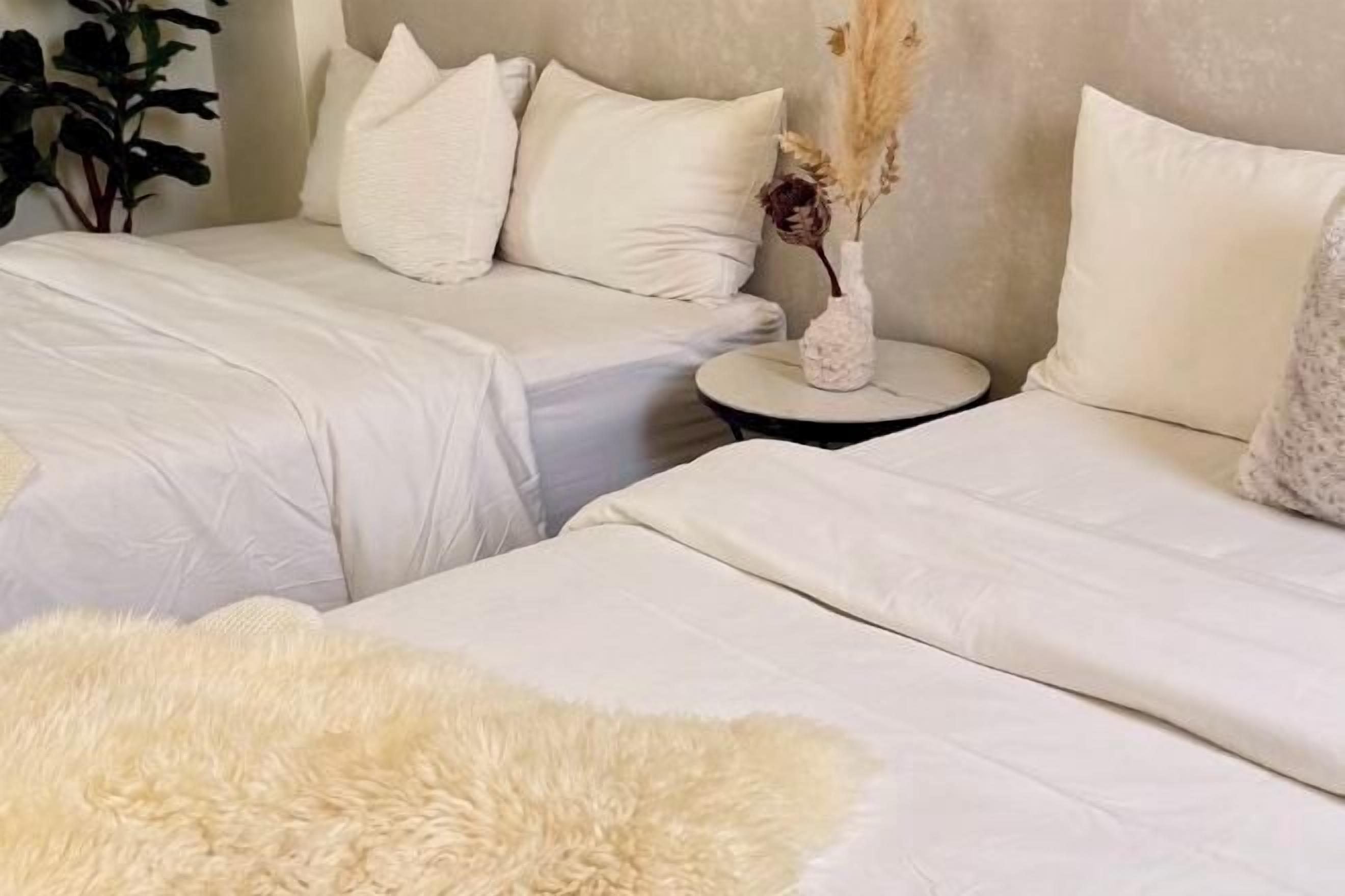 Premium bedding, blackout drapes, soundproofing, free WiFi