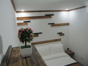 Egyptian cotton sheets, premium bedding, down comforters, pillowtop beds - The Dennison Hotel (Angeles City)