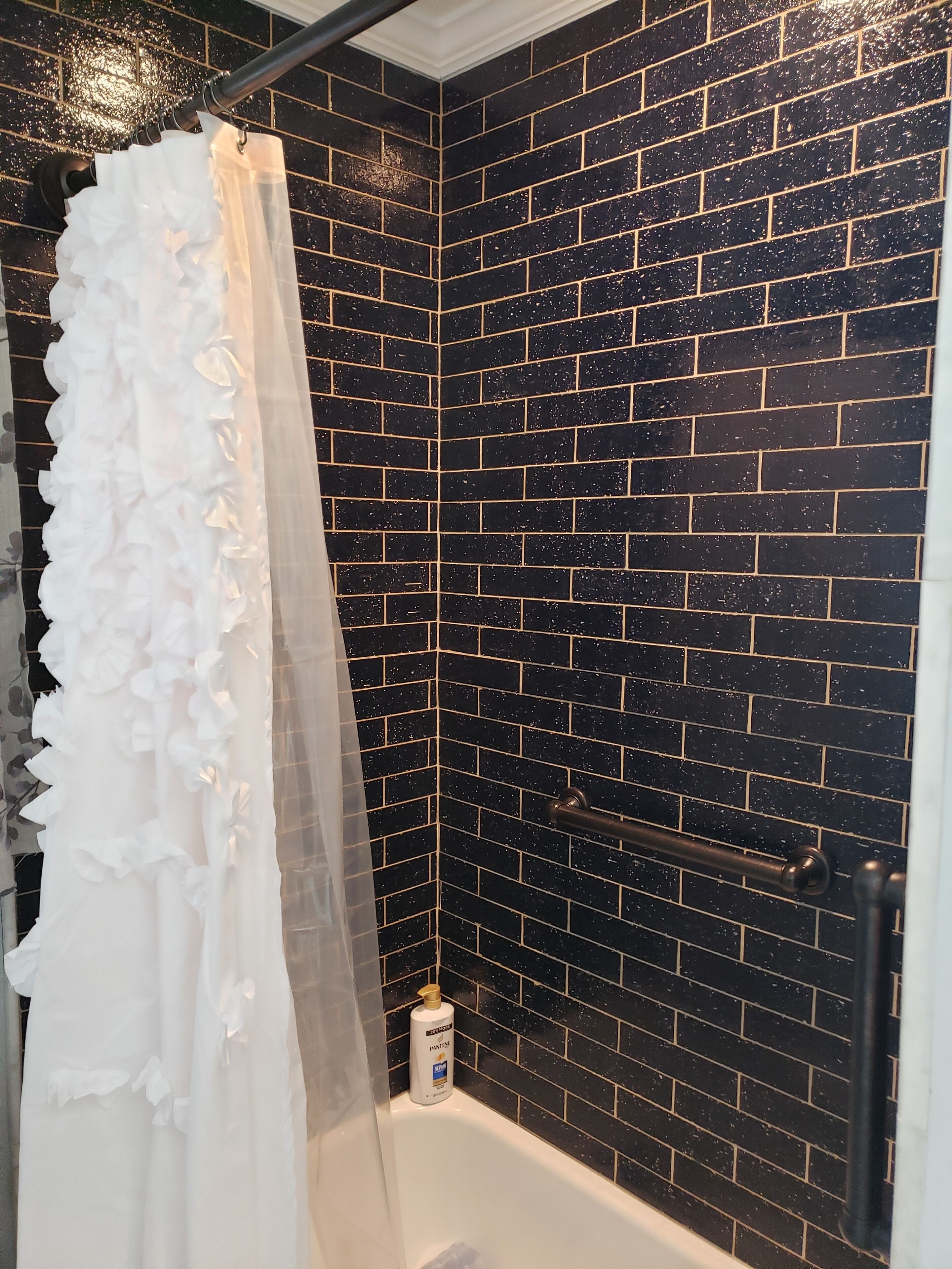 Combined shower/bathtub, hair dryer, towels, soap