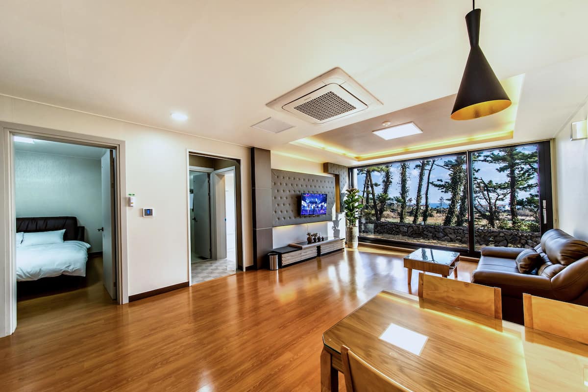 2 Bedrooms (1st floor) | Living room | Flat-screen TV
