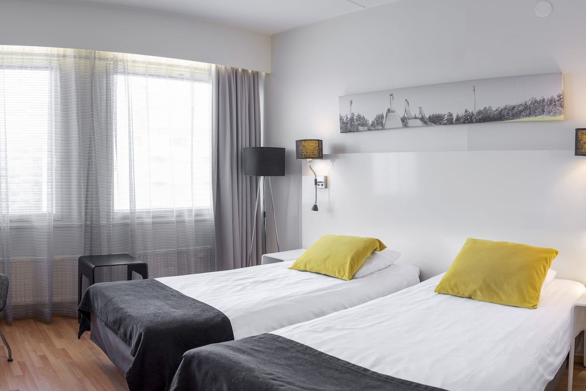 twin room | in-room safe, desk, blackout curtains, iron/ironing board