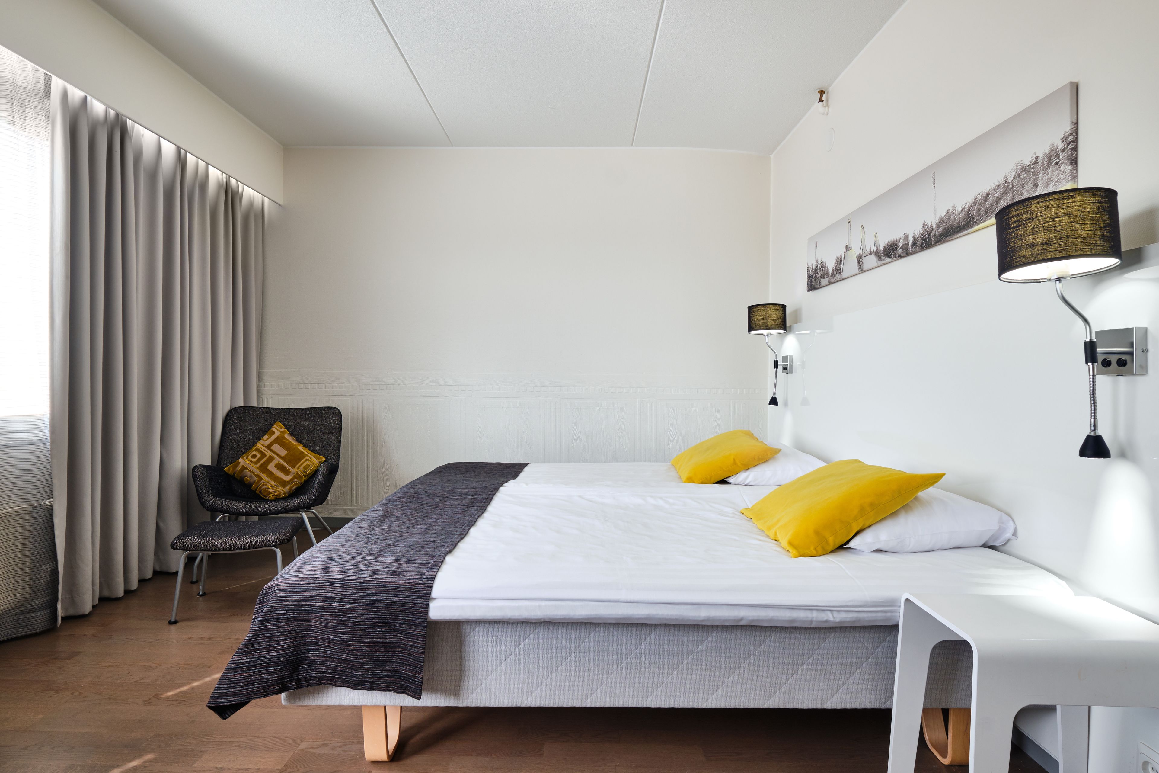 family room | in-room safe, desk, blackout curtains, iron/ironing board