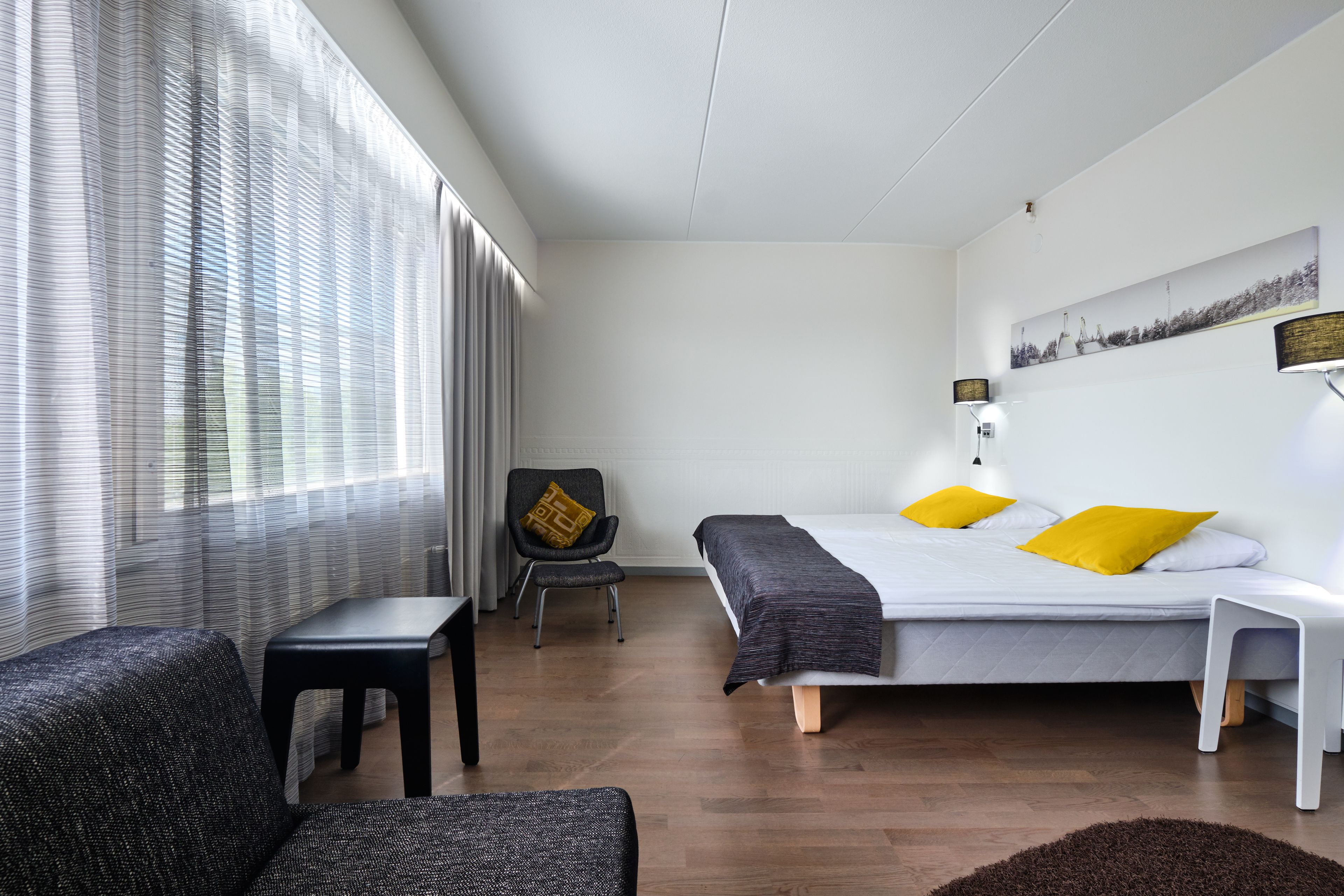 family room | in-room safe, desk, blackout curtains, iron/ironing board