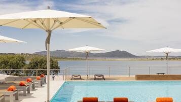 Outdoor pool, pool umbrellas, pool loungers