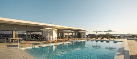 Outdoor pool, pool umbrellas, pool loungers