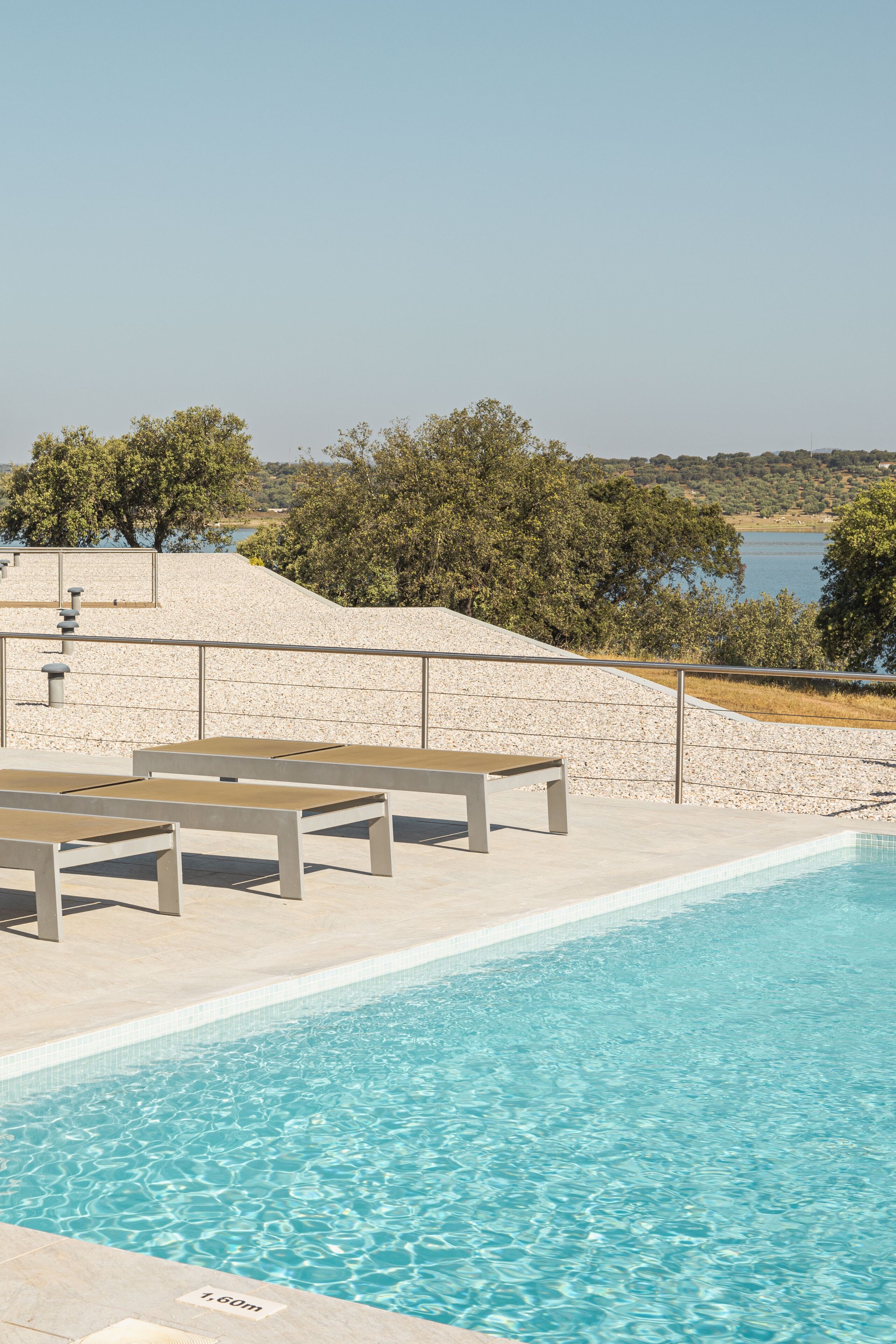 outdoor pool, pool umbrellas, pool loungers