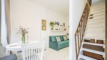 Apartamento familiar | 1 dormitorio, cortinas opacas, tabla de planchar con plancha