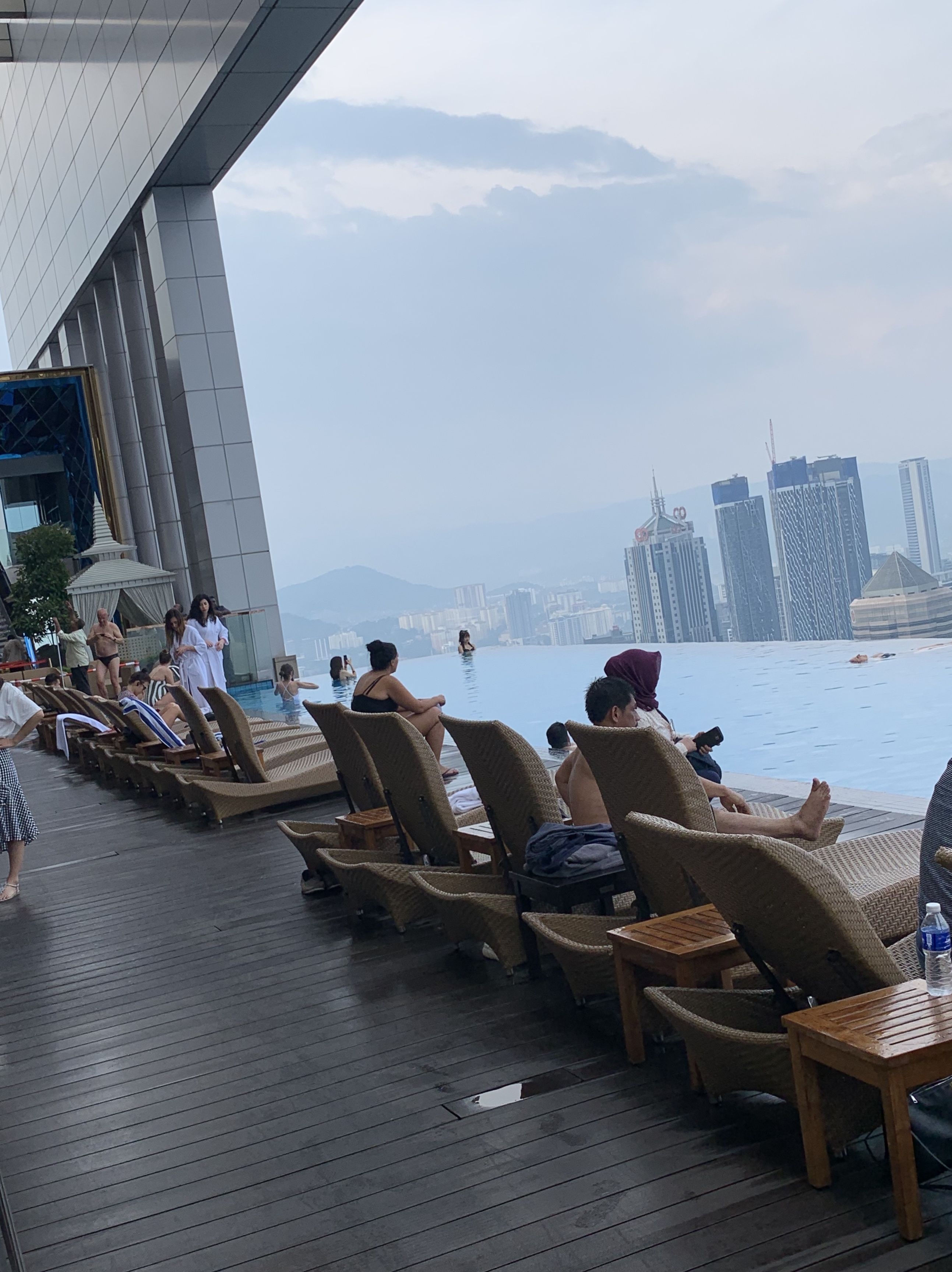 Outdoor pool, open 10:00 AM to 10:00 PM, pool loungers