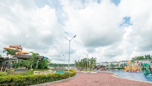 A water park with slides, a pool, and a brick pathway. - Ban-aw Candon (Candon)