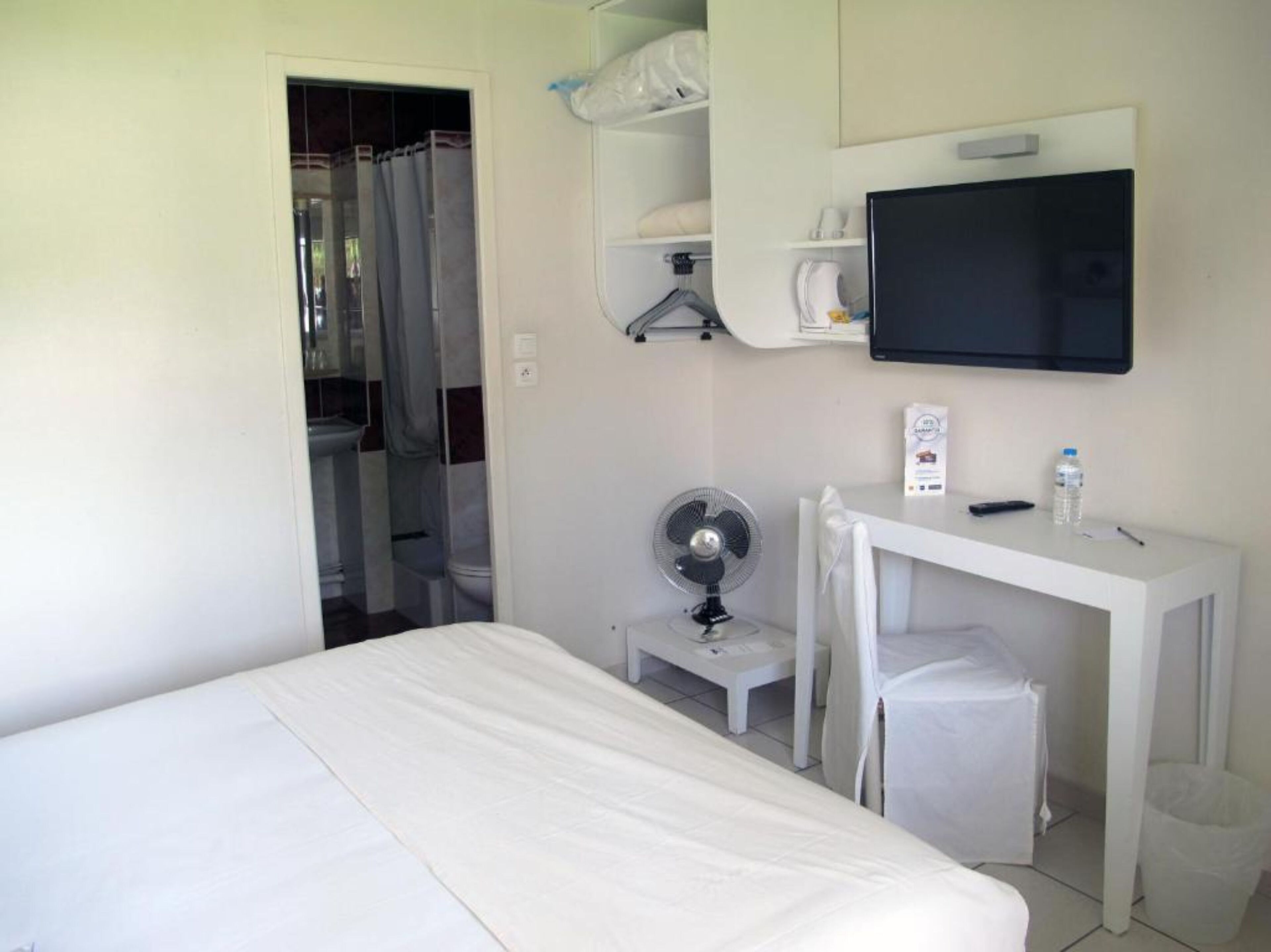 Family Quadruple Room | In-room safe, individually decorated, individually furnished, desk