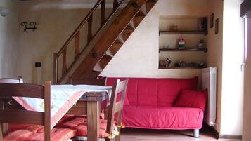 Apartment, 1 Bedroom (Ghiro) | Living area | TV