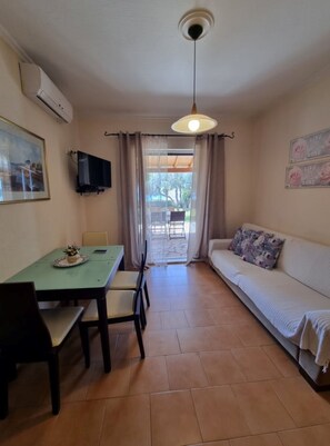 Luxury Apartment, 2 Bedrooms | Living area | Flat-screen TV