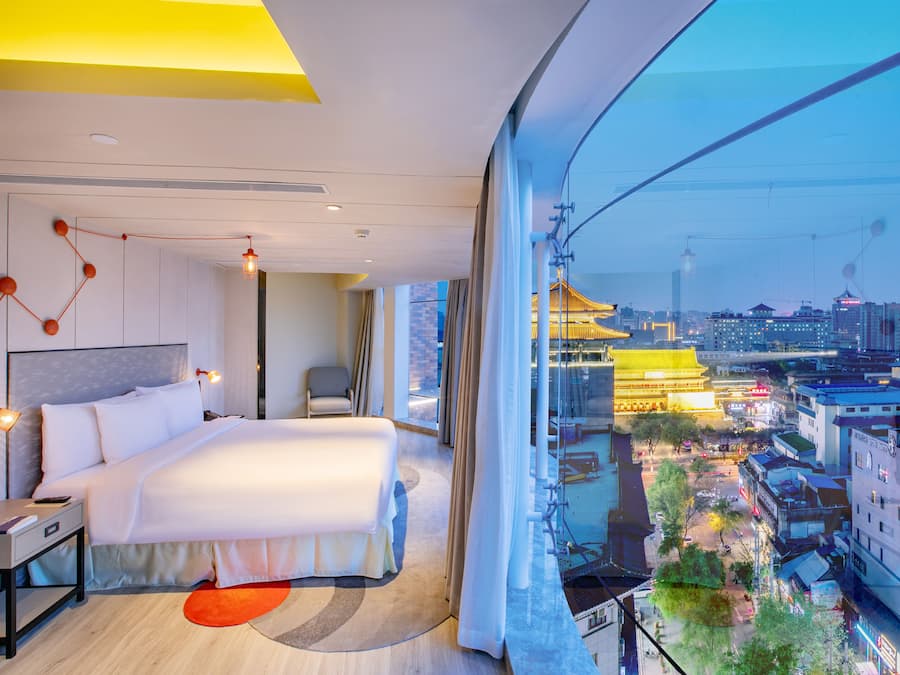 270° Panorama Suite | Minibar, desk, laptop workspace, blackout drapes