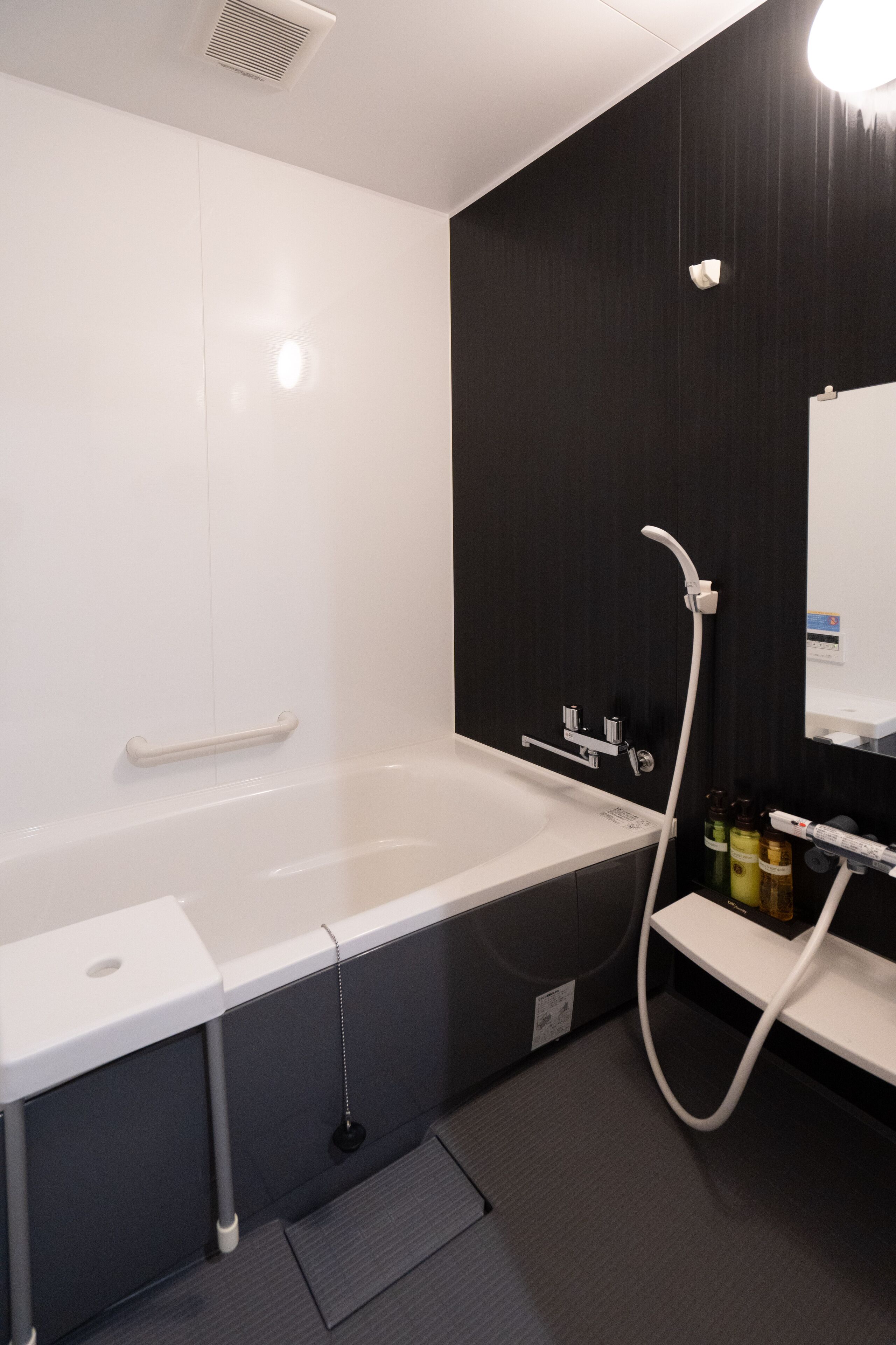 Comfort Condo, 2 Bedrooms (C) | Bathroom | Combined shower/bathtub, free toiletries, hair dryer, slippers