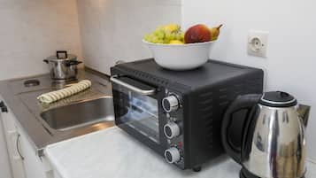 Departamento, 1 habitación | Cocina privada | Refrigerador, microondas, horno y parrilla de estufa