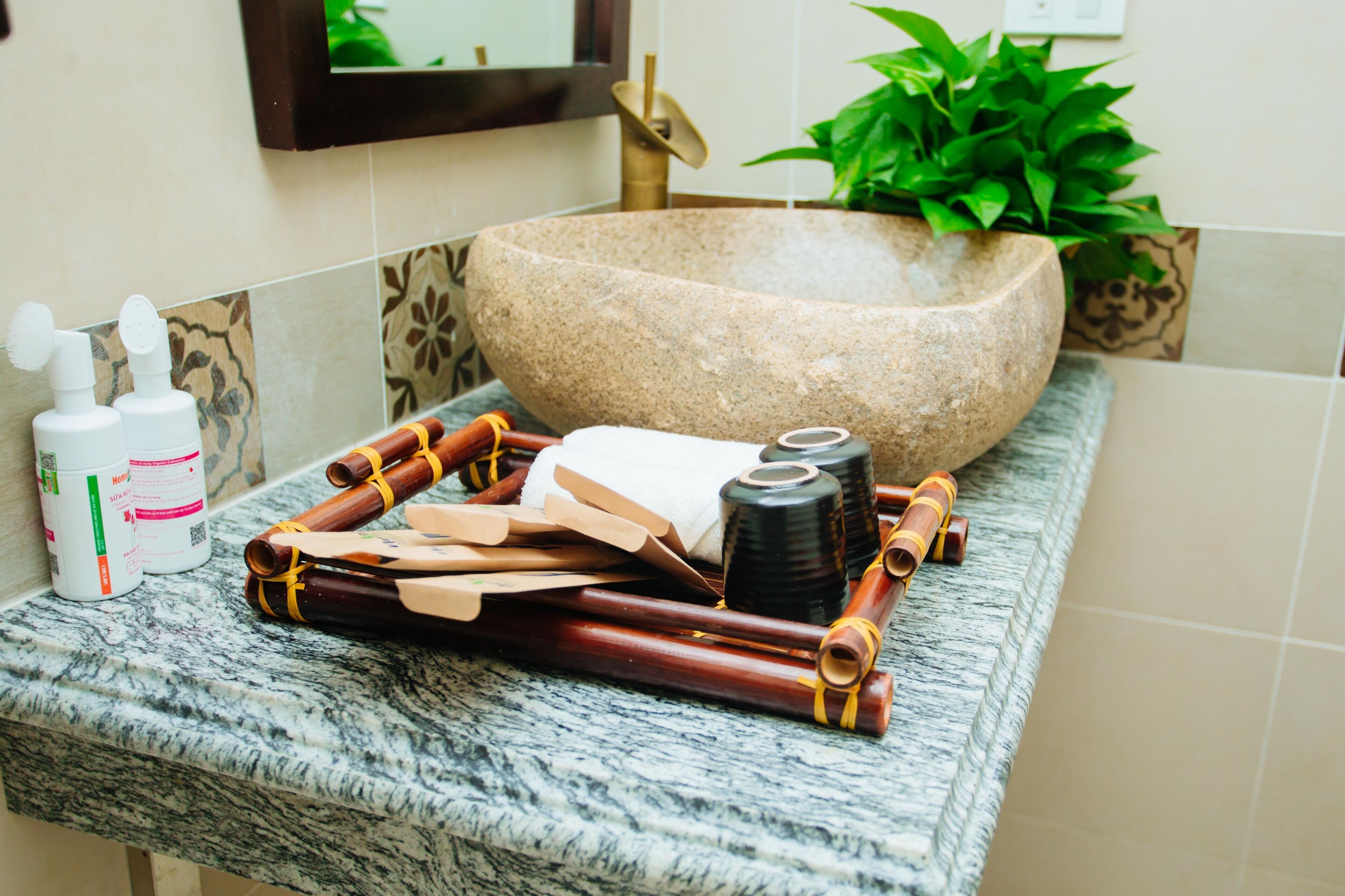 deep-soaking bathtub, rainfall showerhead, hair dryer, bathrobes