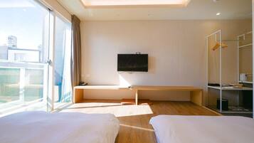 Deluxe Quadruple Room | 1 bedroom, blackout drapes, free WiFi, bed sheets