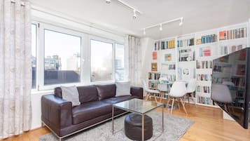 Family Apartment | Living area | Flat-screen TV