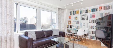 Family Apartment | Living area | Flat-screen TV