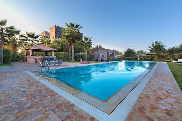 Outdoor pool, pool umbrellas, pool loungers