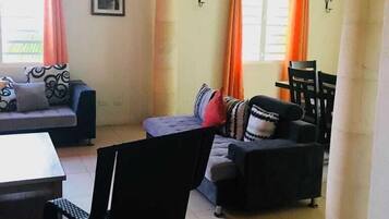 50-inch flat-screen TV with cable channels, Smart TV