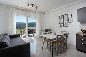 Appartement (A3) | Salle de séjour | Téléviseur à écran plat