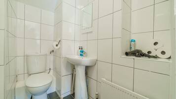 Basic Double Room, 2 Double Beds, Non Smoking | Bathroom | Combined shower/bathtub, hair dryer, towels, shampoo