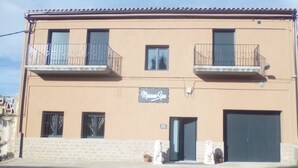 A two-story building with a sign reading "Museum Spa".