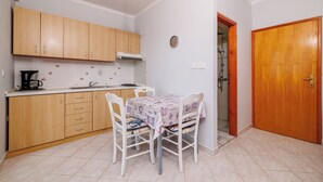 Apartment (A3) | Private kitchen | Espresso maker, fridge, oven, stovetop - Apartments Dijana (Crikvenica)