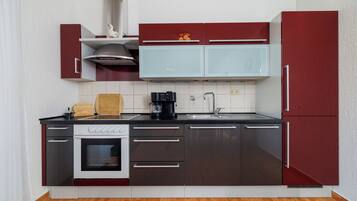 Appartamento (A3) | Cucina privata | Frigorifero, forno, piano cottura, macchina per caffè espresso