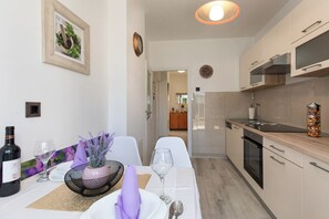 Apartment (A1) | Private kitchen | Fridge, microwave, stovetop, espresso maker - Apartments Lavanda-kate (Krk)