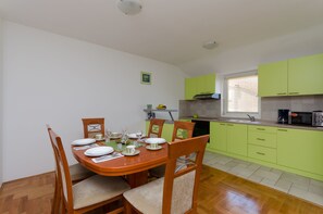 Private kitchen | Fridge, microwave, oven, stovetop - Apartments Dunja (Malinska-Dubasnica)