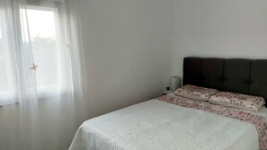 Apartamento (A1) | 1 quarto, ferros/tábuas de passar roupa, roupa de cama